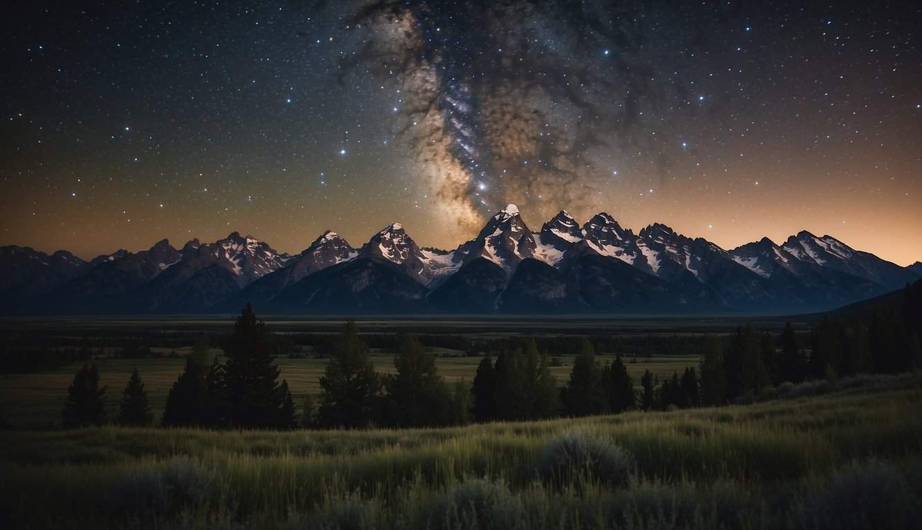 A clear night sky over Driggs, with twinkling stars and a visible Milky Way, framed by the silhouette of the Teton Mountains